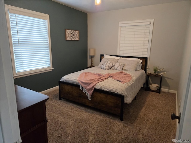 148 15th St, Burlington, CO 80807 - carpeted bedroom with baseboards
