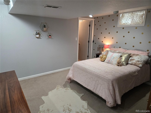 148 15th St, Burlington, CO 80807 - carpeted bedroom featuring baseboards