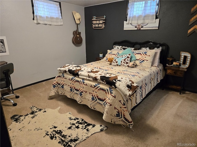 148 15th St, Burlington, CO 80807 - bedroom featuring carpet and baseboards