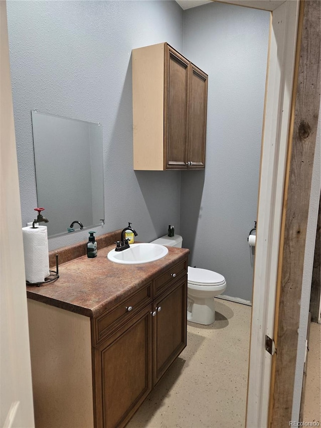 148 15th St, Burlington, CO 80807 - bathroom with toilet and vanity