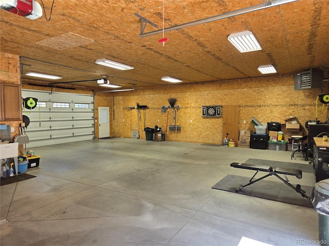 148 15th St, Burlington, CO 80807 - garage featuring a garage door opener