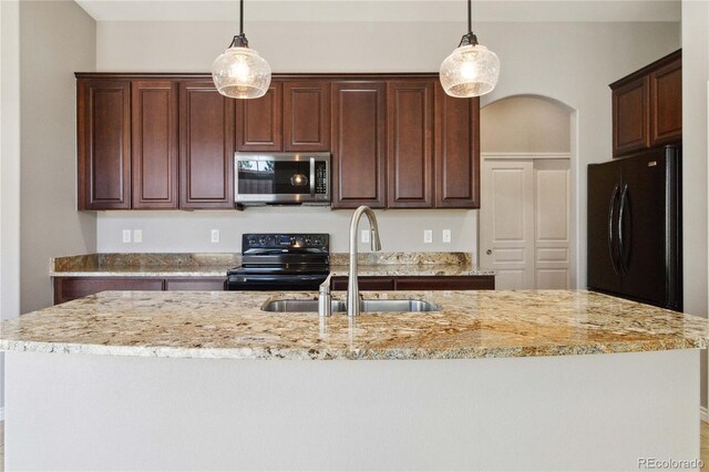 5895 S Taft Ct Unit H, Littleton, CO 80127 - kitchen with black appliances, a sink, pendant lighting, and light stone counters