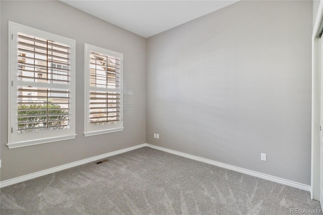 5895 S Taft Ct Unit H, Littleton, CO 80127 - carpeted empty room with baseboards