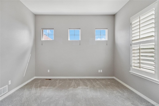 5895 S Taft Ct Unit H, Littleton, CO 80127 - carpeted spare room with baseboards