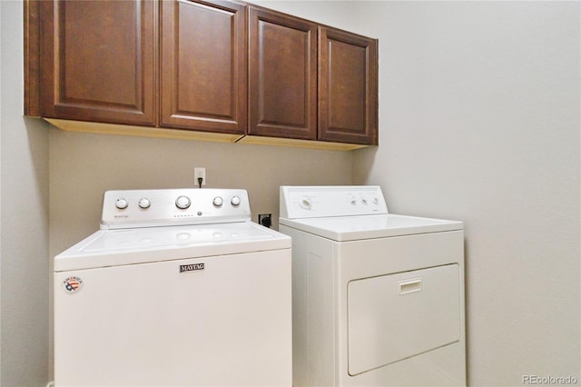 5895 S Taft Ct Unit H, Littleton, CO 80127 - clothes washing area featuring washing machine and dryer and cabinet space