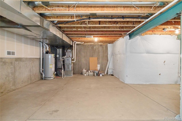 5895 S Taft Ct Unit H, Littleton, CO 80127 - unfinished basement featuring water heater