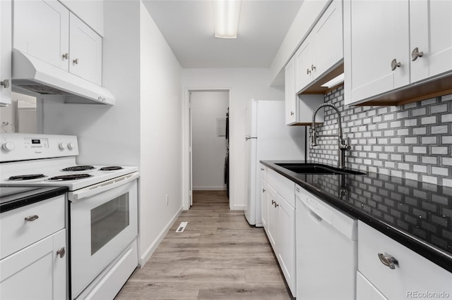 kitchen with tasteful backsplash, sink, white appliances, light wood-type flooring, and white cabinets