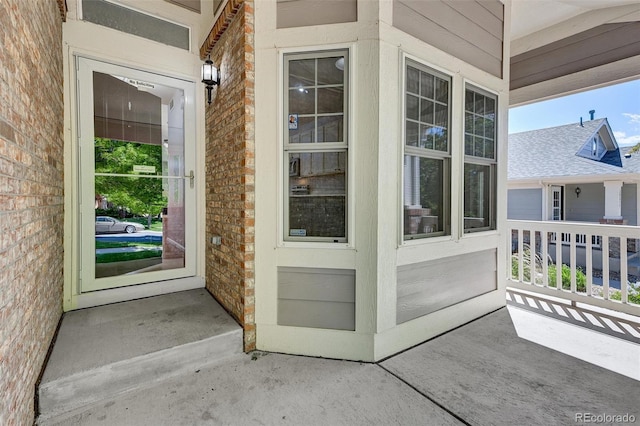 20394 E Colgate Pl, Aurora, CO 80013 - entrance to property with covered porch and stone siding