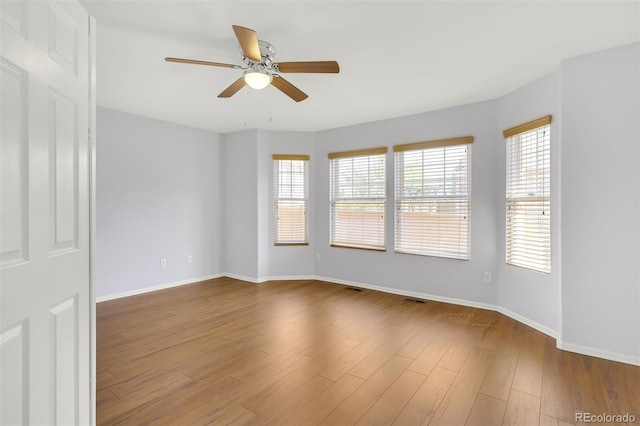 20394 E Colgate Pl, Aurora, CO 80013 - spare room featuring ceiling fan, baseboards, and wood finished floors