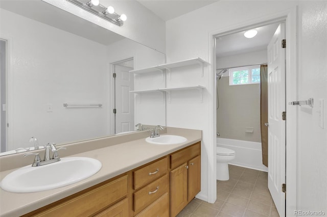 20394 E Colgate Pl, Aurora, CO 80013 - bathroom featuring toilet, double vanity, tile patterned floors, and  shower combination