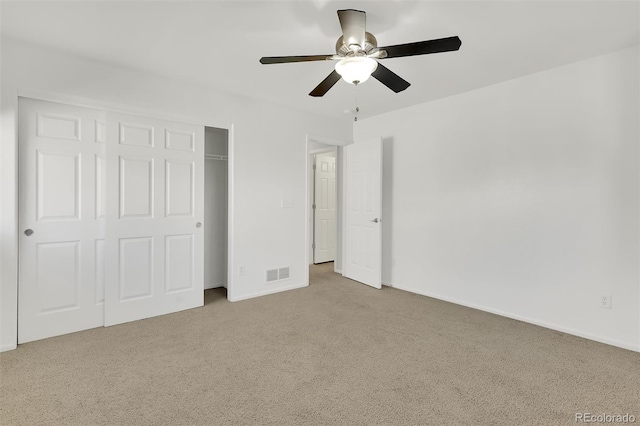 20394 E Colgate Pl, Aurora, CO 80013 - unfurnished bedroom with carpet flooring, a closet, baseboards, and a ceiling fan