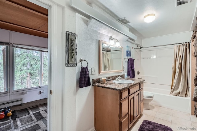 full bathroom featuring baseboard heating, shower / bath combo with shower curtain, visible vents, vanity, and a textured wall
