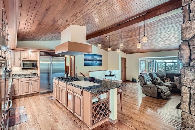 kitchen with wooden ceiling, built in appliances, lofted ceiling, and light brown cabinetry