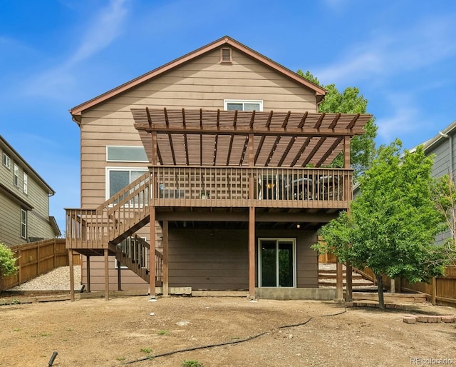 5040 Sweetgrass Ln, Colorado Springs, CO 80922 - back of house featuring a pergola, a deck, and stairs