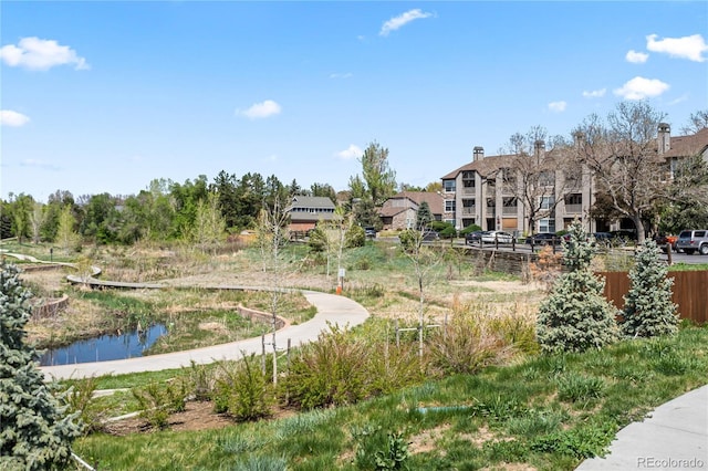 surrounding community featuring fence