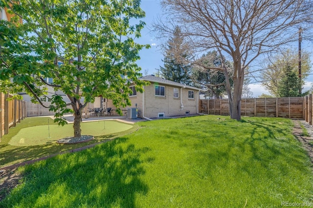 2090 Irving St, Denver, CO 80211 - view of yard with a putting area, central AC, and a patio