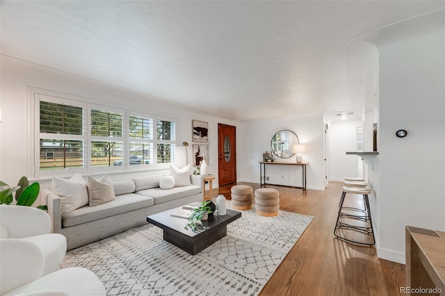 2090 Irving St, Denver, CO 80211 - living area featuring baseboards and wood finished floors