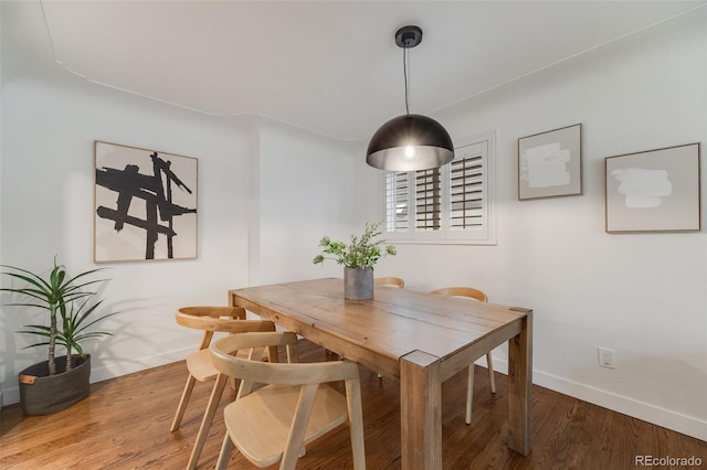2090 Irving St, Denver, CO 80211 - dining area with baseboards and wood finished floors