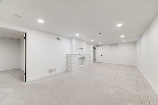 2090 Irving St, Denver, CO 80211 - finished basement featuring light carpet, recessed lighting, baseboards, and a fireplace