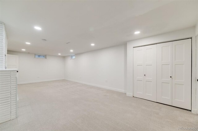 2090 Irving St, Denver, CO 80211 - finished below grade area with recessed lighting, light colored carpet, and baseboards
