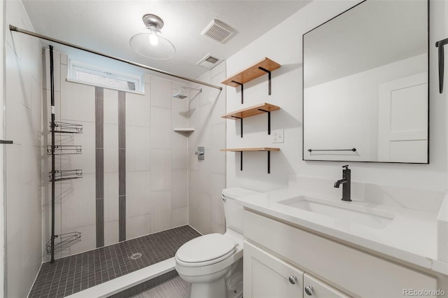 2090 Irving St, Denver, CO 80211 - bathroom with toilet, a stall shower, and vanity