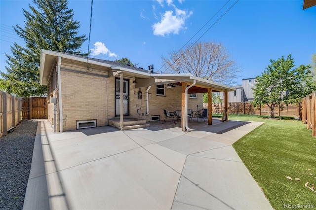 2090 Irving St, Denver, CO 80211 - rear view of house with brick siding and a patio area