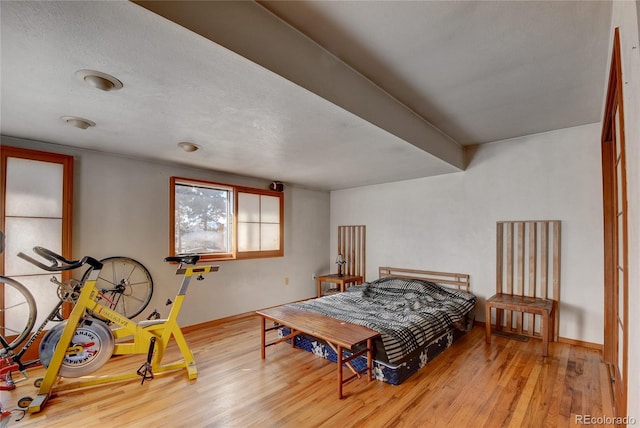 6805 Marshmerry Ln, Evergreen, CO 80439 - bedroom featuring wood finished floors and baseboards
