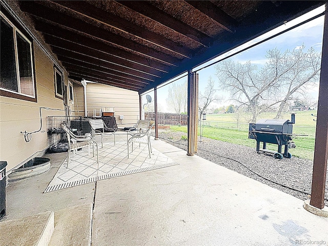 view of patio / terrace featuring fence and area for grilling