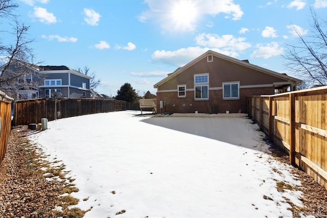 view of snow covered property