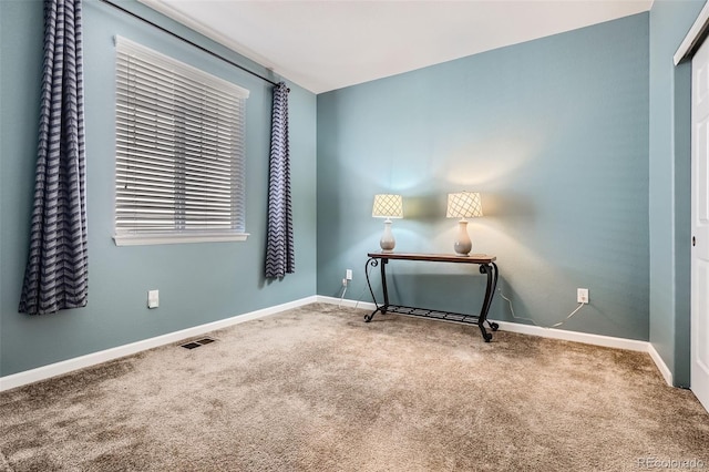 25561 E 5th Pl, Aurora, CO 80018 - unfurnished room featuring carpet flooring and baseboards