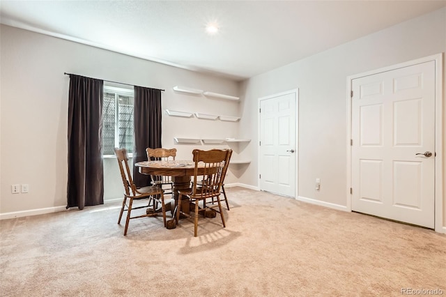 25561 E 5th Pl, Aurora, CO 80018 - carpeted dining area featuring baseboards