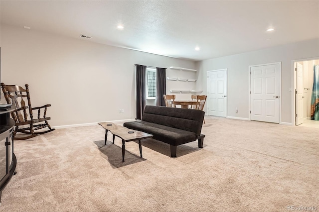 25561 E 5th Pl, Aurora, CO 80018 - living room featuring light carpet, baseboards, and recessed lighting