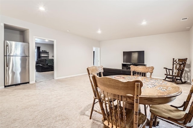 25561 E 5th Pl, Aurora, CO 80018 - dining room featuring baseboards, light carpet, and recessed lighting