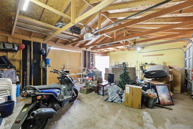 garage featuring a garage door opener