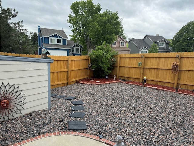 6887 S Dover Way, Littleton, CO 80128 - fenced backyard with a residential view and an outbuilding