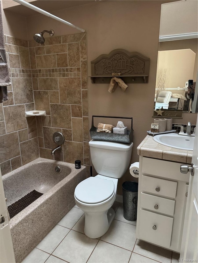 6887 S Dover Way, Littleton, CO 80128 - full bathroom featuring toilet, vanity, tile patterned flooring, and  shower combination