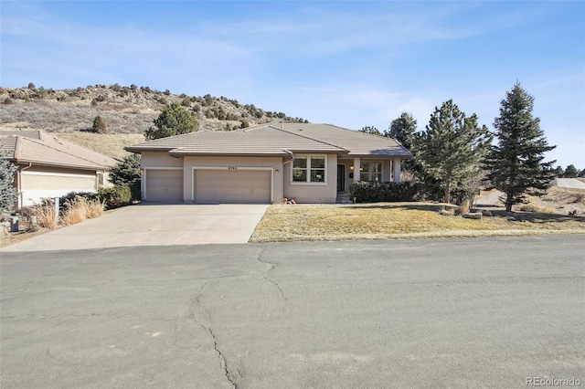 view of front of property with a garage