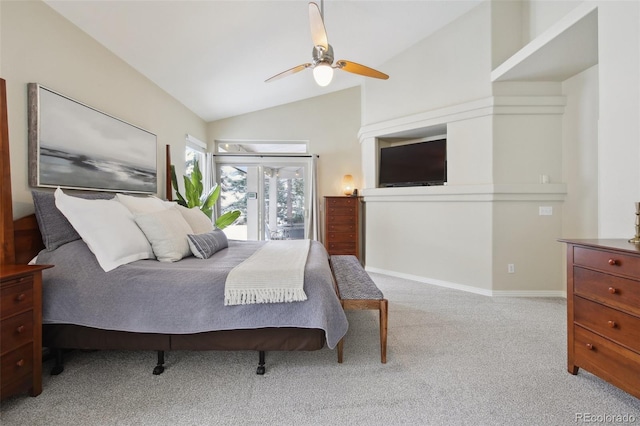 bedroom with ceiling fan, vaulted ceiling, and light carpet