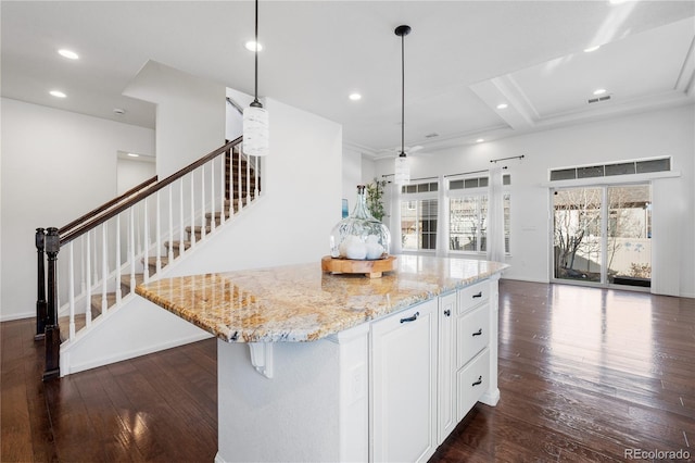 kitchen featuring dark wood finished floors, recessed lighting, white cabinets, and light stone countertops