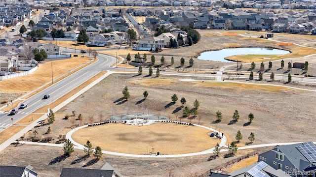 birds eye view of property with a residential view