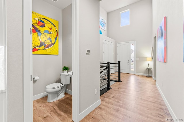 17720 W 94th Dr, Arvada, CO 80007 - hallway with light wood-style flooring and baseboards