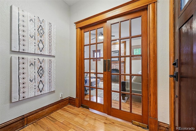 3928 Zuni St, Denver, CO 80211 - detailed view of wood finished floors, french doors, and baseboards