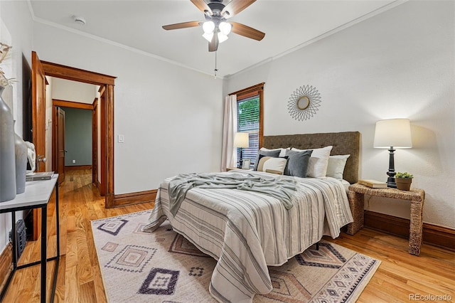 3928 Zuni St, Denver, CO 80211 - bedroom with crown molding, baseboards, light wood-style floors, and ceiling fan