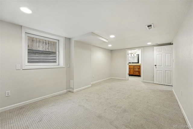 3928 Zuni St, Denver, CO 80211 - finished below grade area with light carpet, baseboards, and recessed lighting