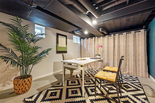 3928 Zuni St, Denver, CO 80211 - dining space featuring baseboards and concrete floors