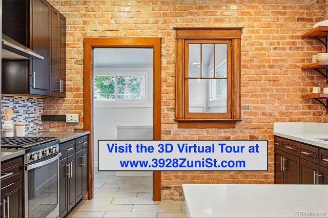 3928 Zuni St, Denver, CO 80211 - kitchen with gas range, tasteful backsplash, and dark brown cabinets