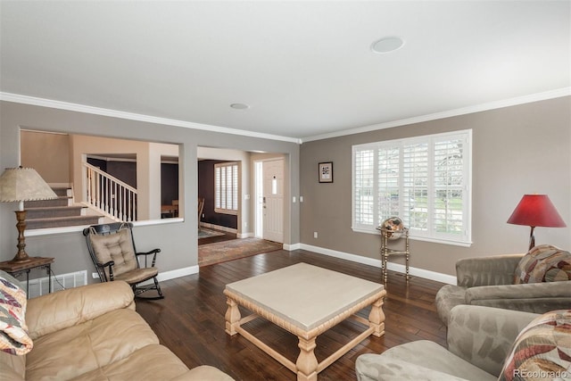 living room featuring crown molding, stairway, hardwood / wood-style flooring, and baseboards