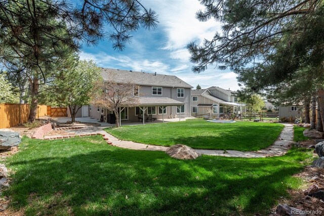 back of property with a patio area
