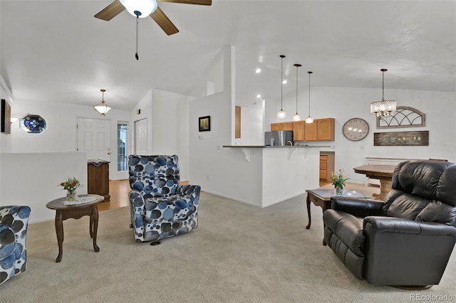 12454 Tex Tan Rd, Peyton, CO 80831 - living area with light colored carpet, a ceiling fan, baseboards, high vaulted ceiling, and a chandelier