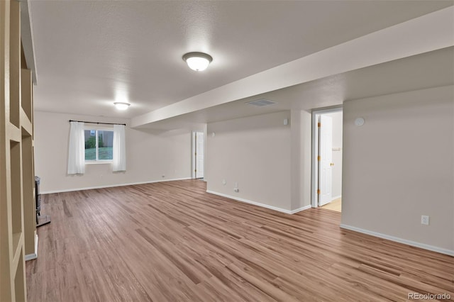 12454 Tex Tan Rd, Peyton, CO 80831 - basement with light wood-style flooring and baseboards